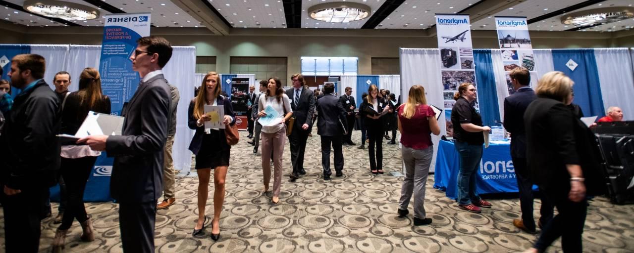 Picture of Fall Career Fair with students walking around the ball room